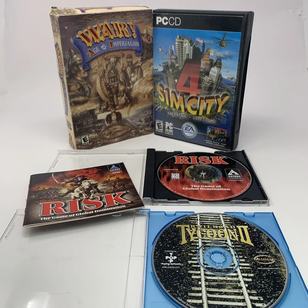 Lot 4 Vintage PC Games CD-ROM: RISK, War, Railroad Tycoon, SimCity 4